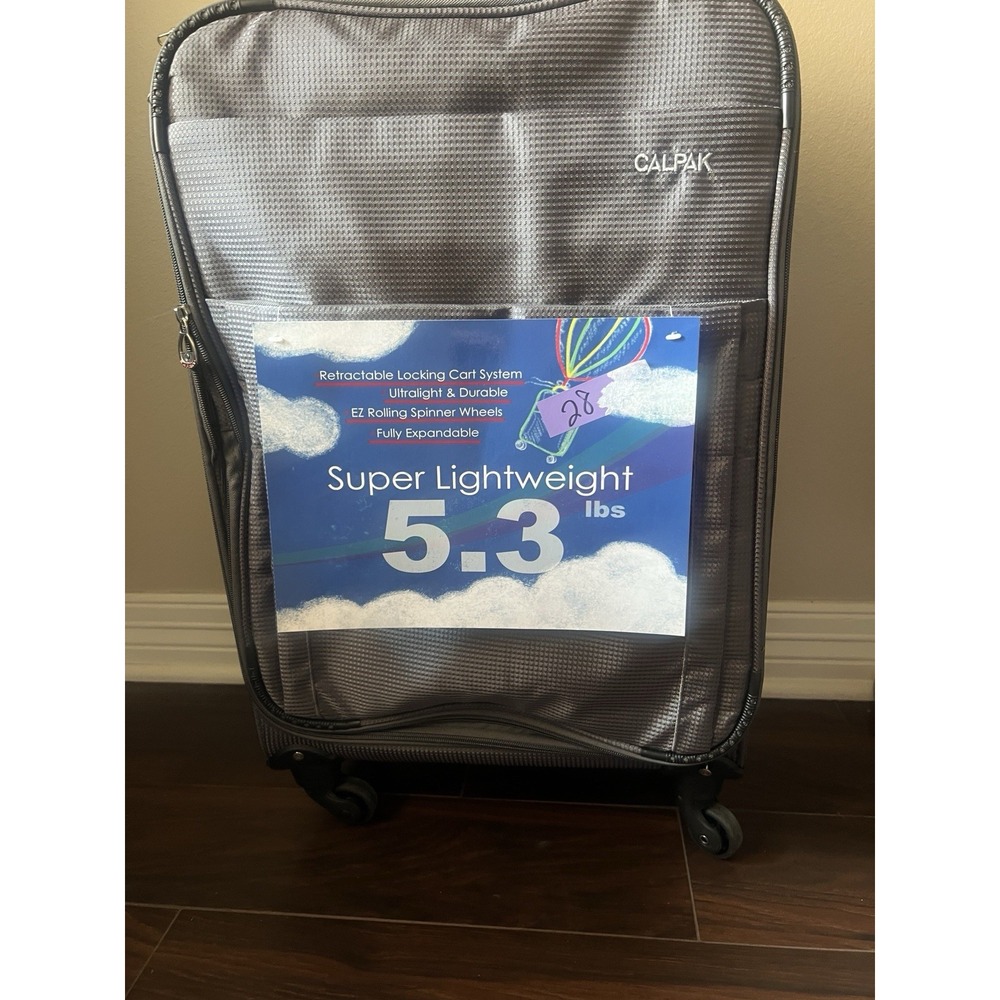 Calpak Gray Textured Spinner Suitcase